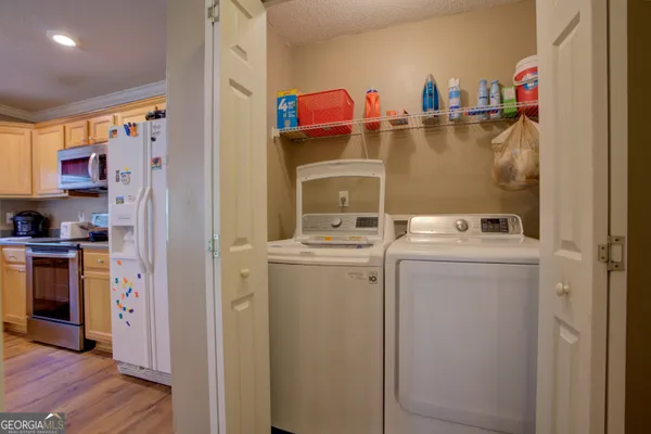 a utility room with dryer and washer