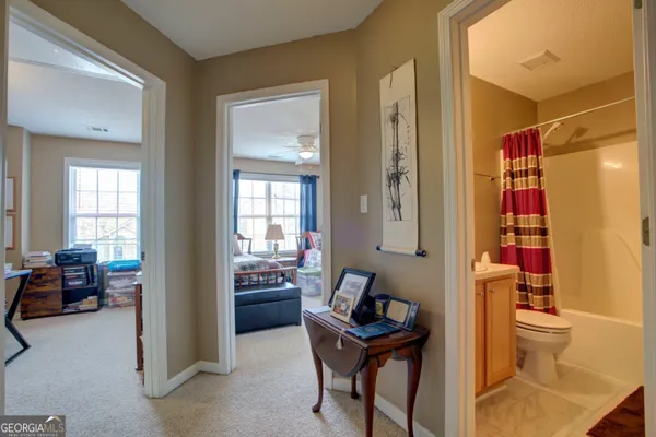 a living room with furniture and a gate