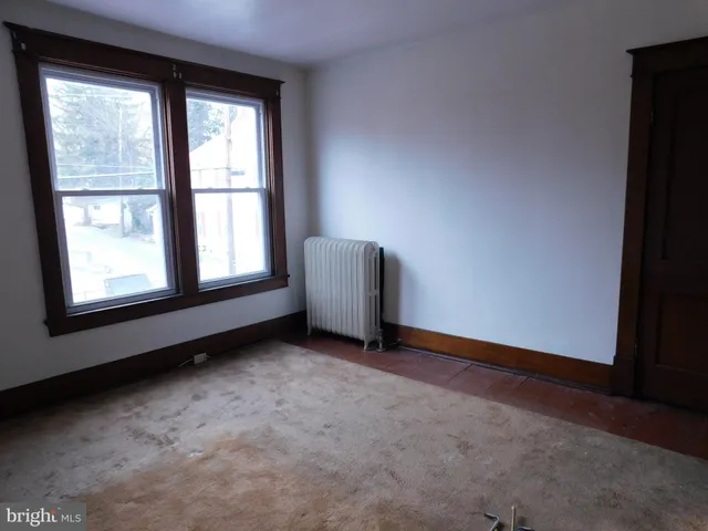 a bathroom with a toilet a sink and bathtub