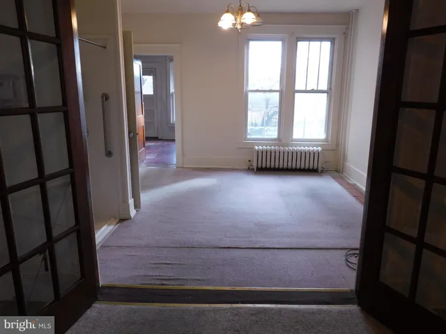 an empty room with window