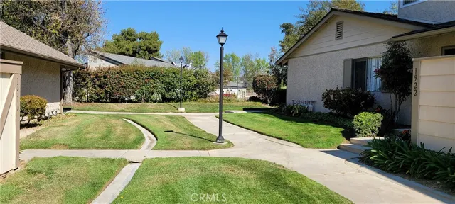 a view of a house with swimming pool
