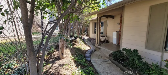 a backyard of a house with lots of green space