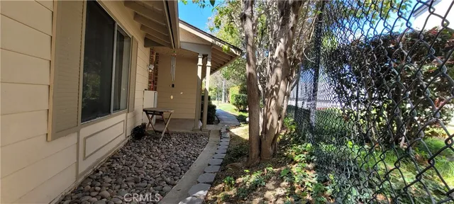 a view of a back yard of the house
