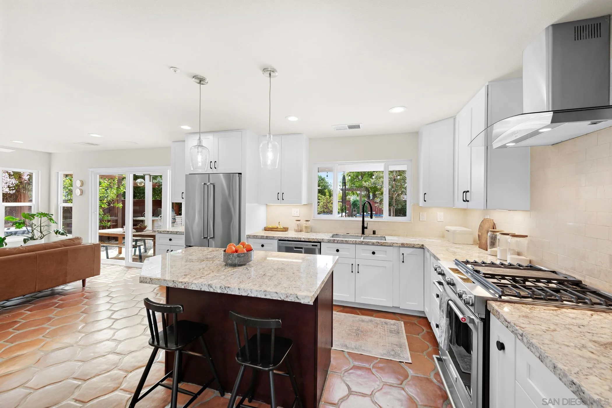 111 Wintercreek Place Santee, CA 92071 - Photo 1 of 53 a kitchen with a stove a sink a dining table and chairs