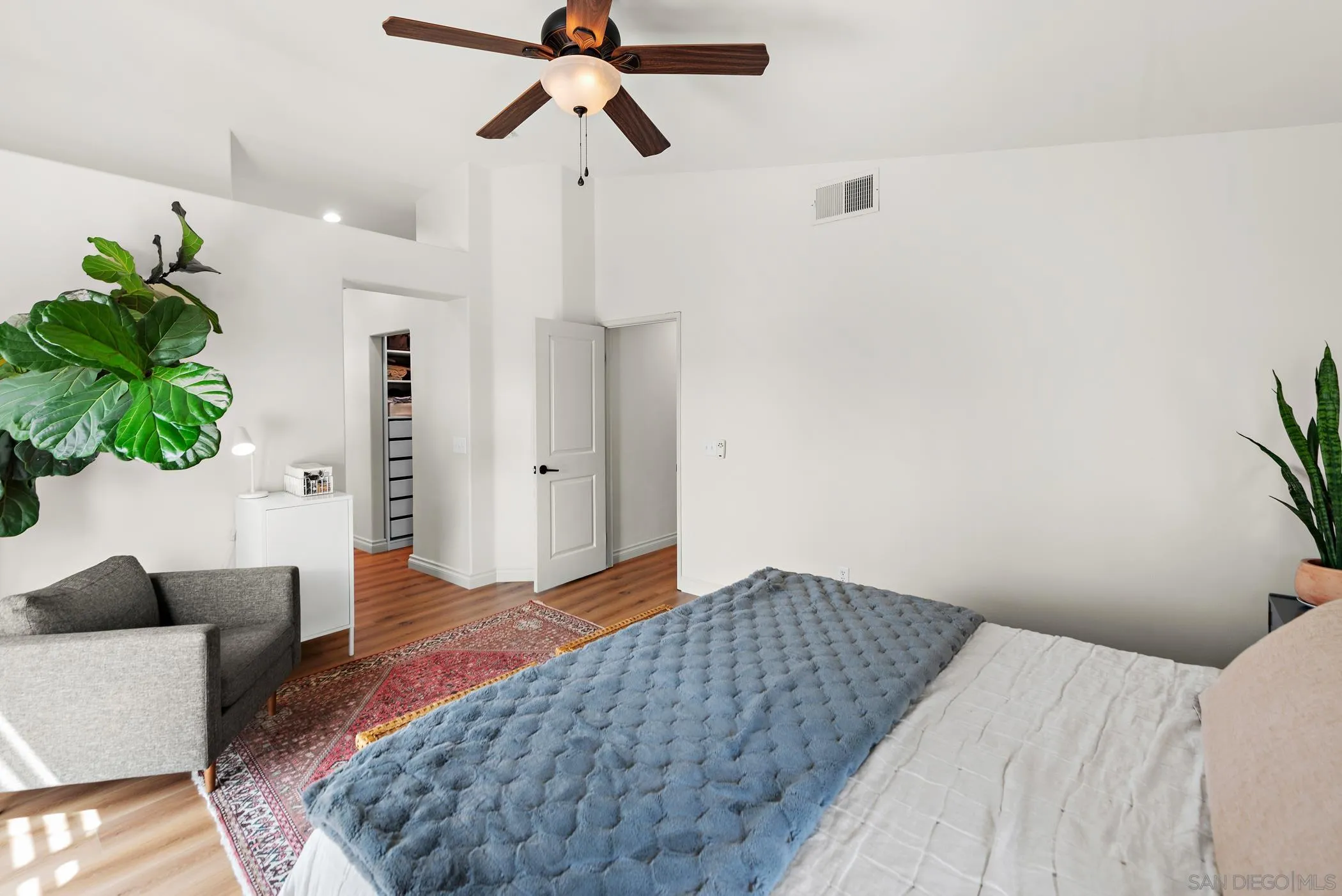 111 Wintercreek Place Santee, CA 92071 - Photo 22 of 53 a bedroom with a bed and a chandelier