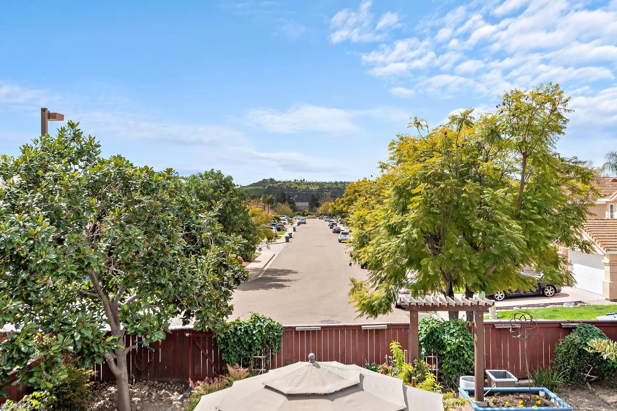 111 Wintercreek Place Santee, CA 92071 - Photo 26 of 53 a view of a lake with a house in the background