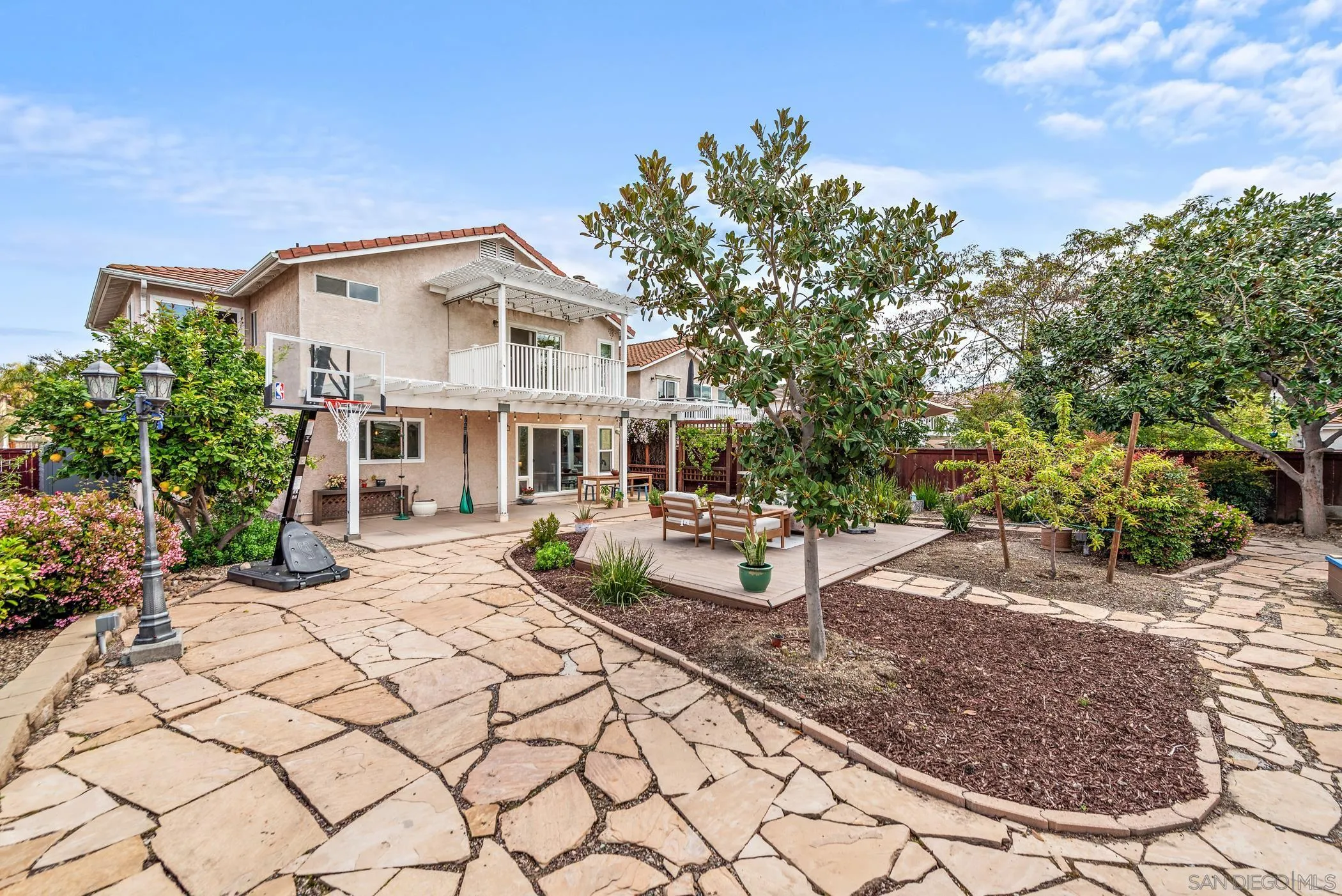 111 Wintercreek Place Santee, CA 92071 - Photo 32 of 53 a view of a house with backyard and sitting area