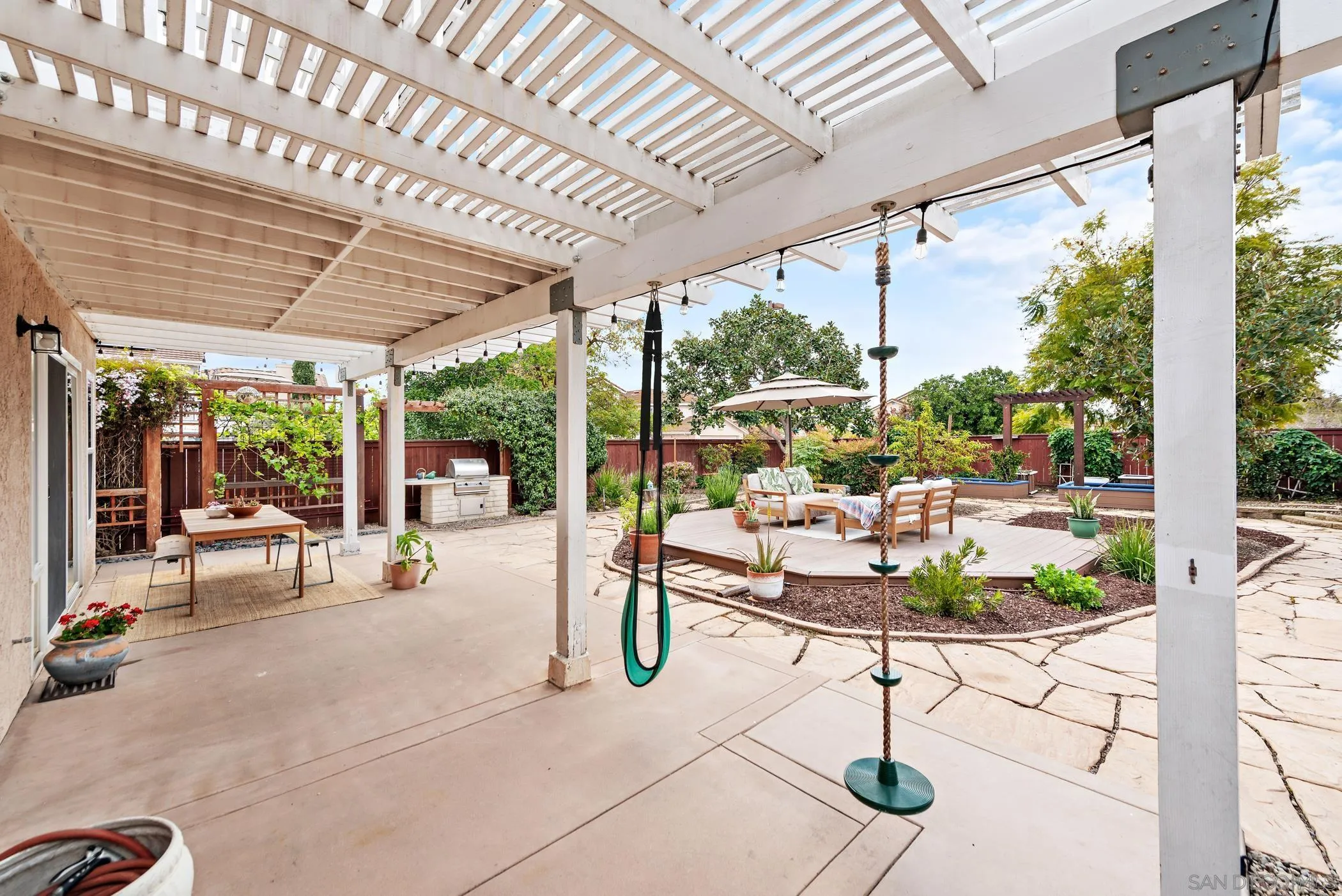 111 Wintercreek Place Santee, CA 92071 - Photo 33 of 53 a view of a patio with a table and chairs