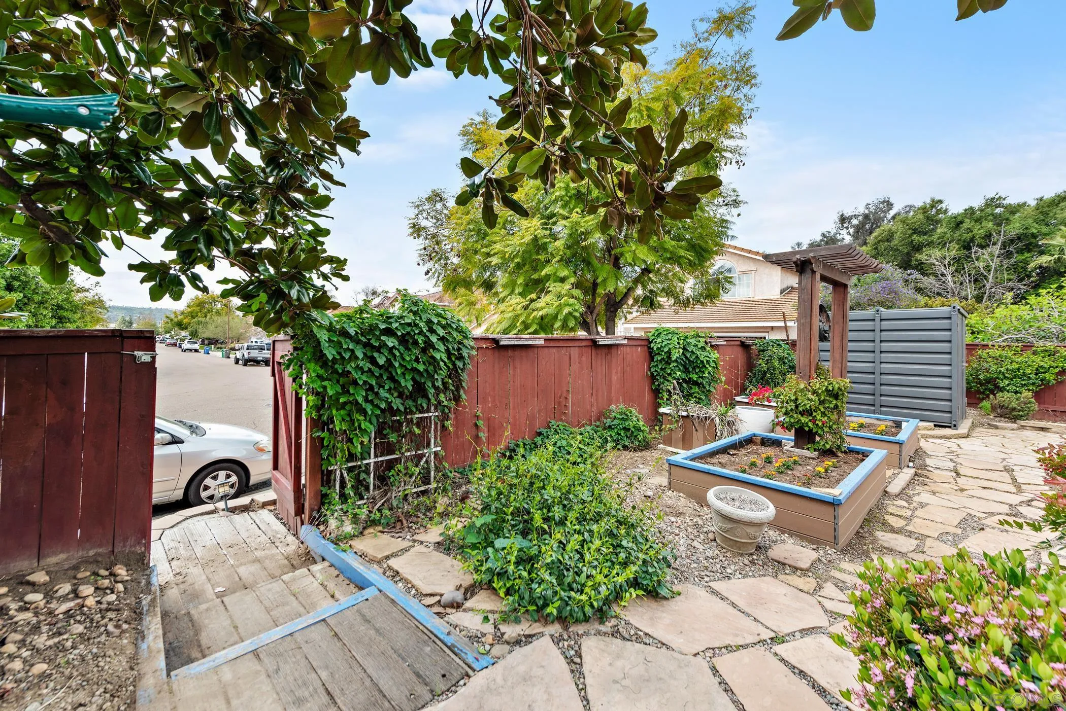111 Wintercreek Place Santee, CA 92071 - Photo 35 of 53 a backyard of a house with lots of green space