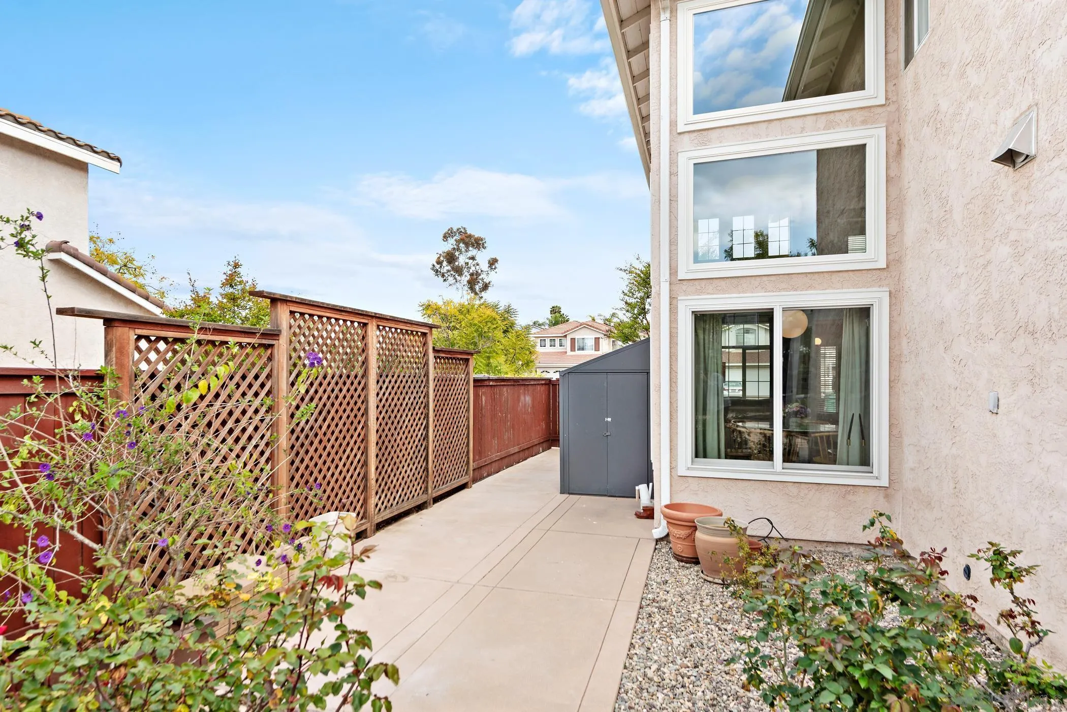 111 Wintercreek Place Santee, CA 92071 - Photo 36 of 53 a view of a house with a flower garden