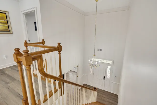 a view of a hallway with staircase