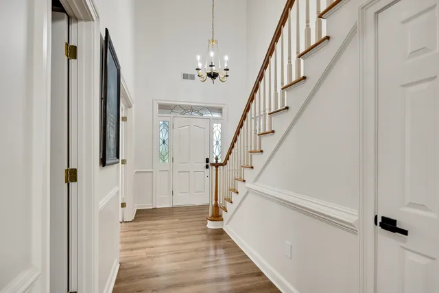 a view of staircase with wooden floor and staircase