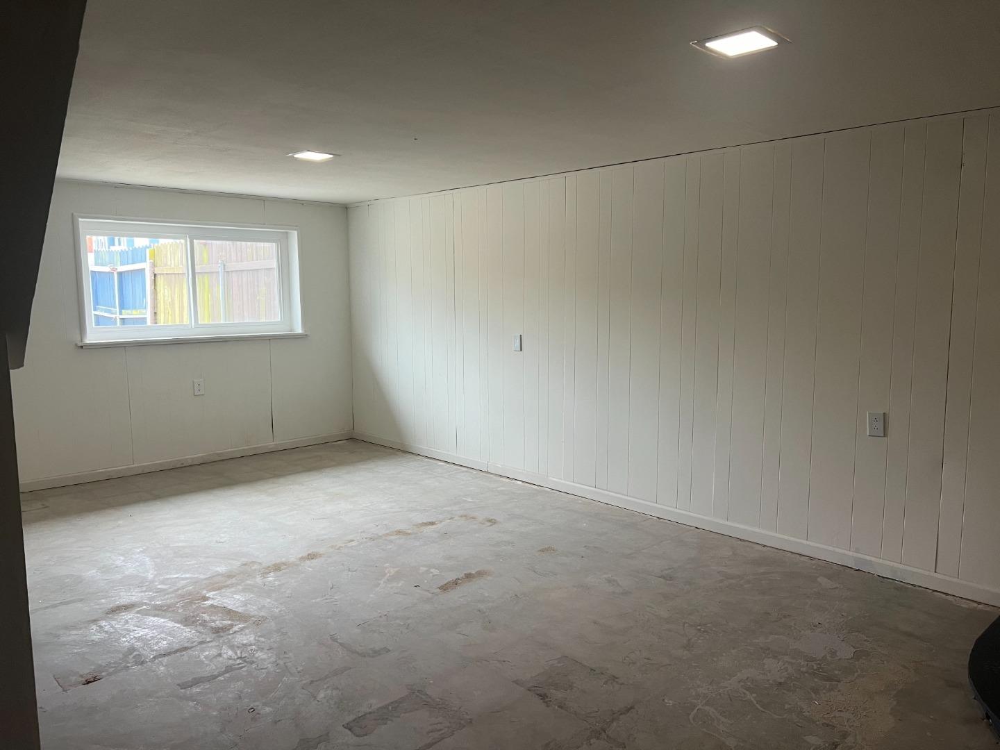 99 Castillejo Drive Daly City, CA 94015 - Photo 17 of 21 an empty room with a empty space and window