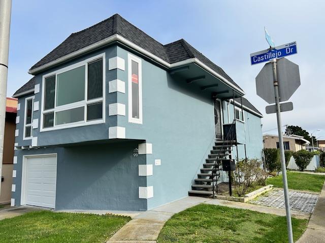 99 Castillejo Drive Daly City, CA 94015 - Photo 2 of 21 a front view of a house with a yard