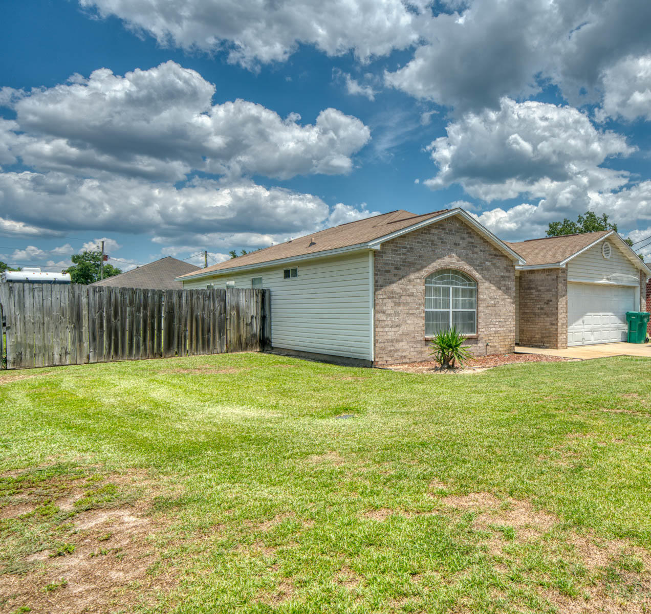 1755 Old Ranch Road Fort Walton Beach, FL 32547 - Photo 1 of 35 a front view of house with yard barbeque and outdoor seating