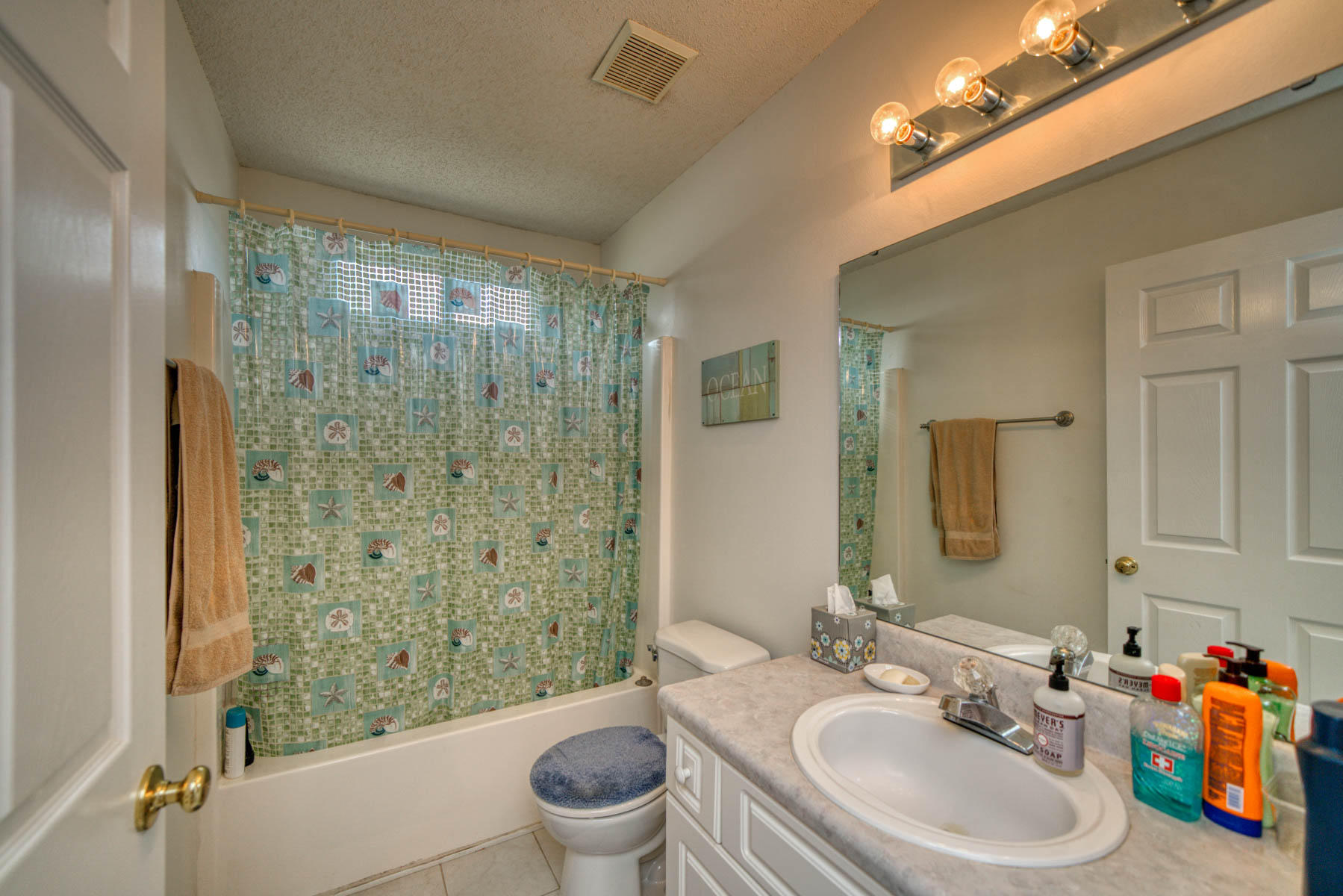 1755 Old Ranch Road Fort Walton Beach, FL 32547 - Photo 26 of 35 a bathroom with a sink toilet and shower