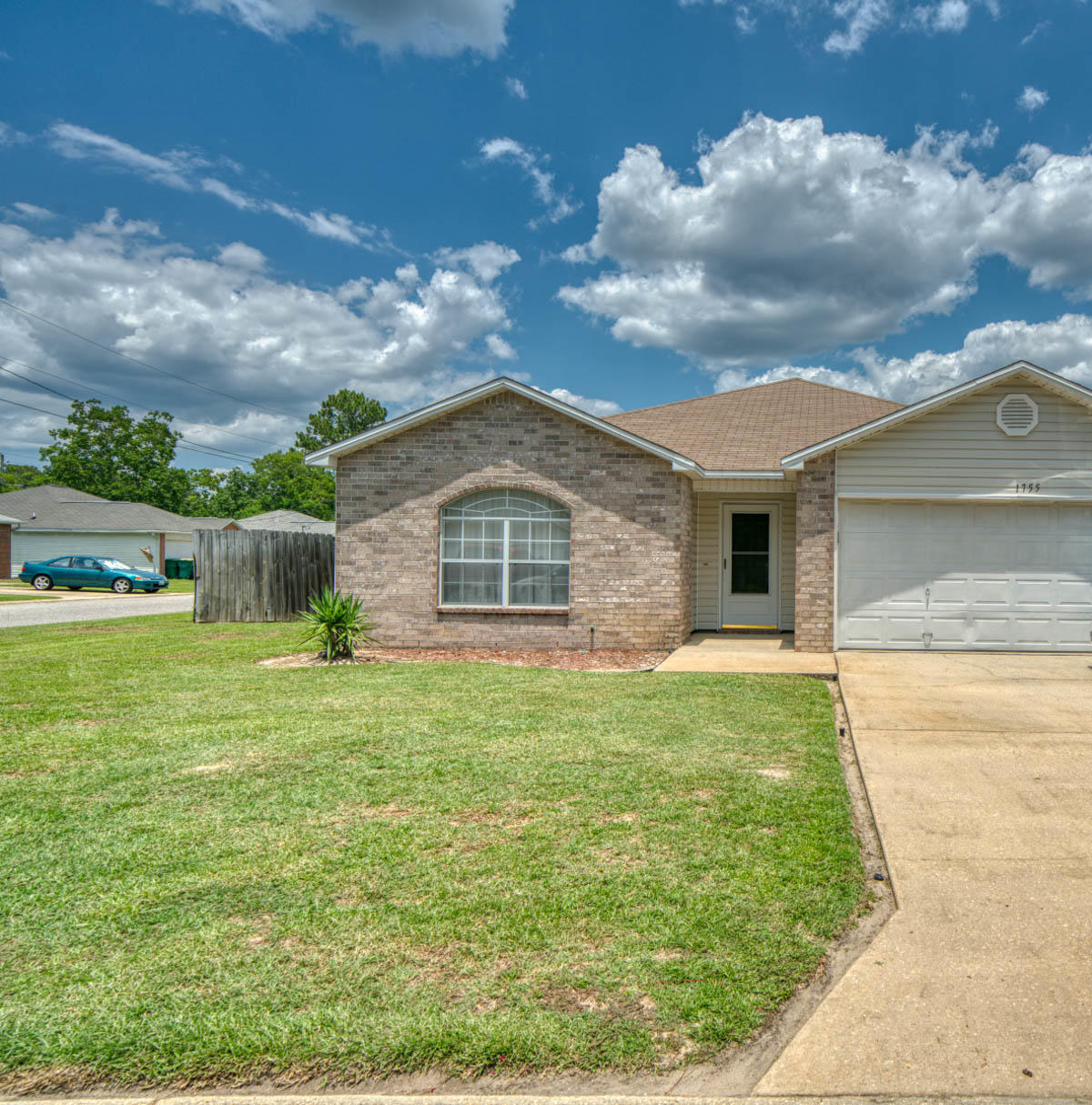 1755 Old Ranch Road Fort Walton Beach, FL 32547 - Photo 35 of 35 a front view of a house with garden