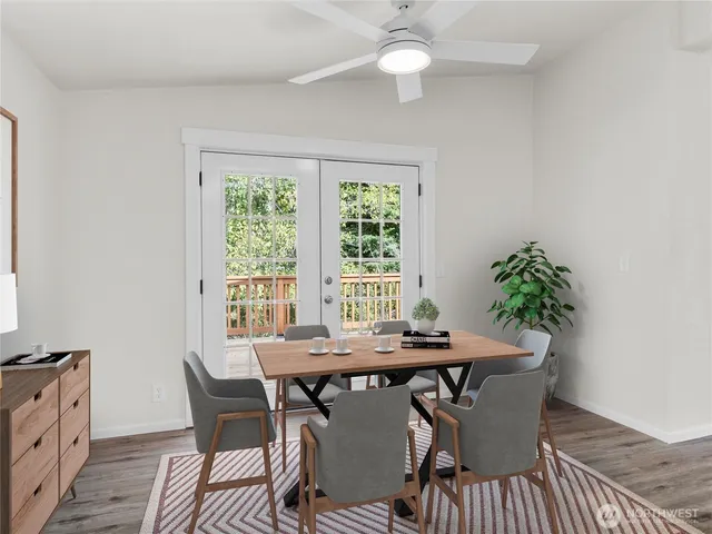 a view of a dining room with furniture window and outside view