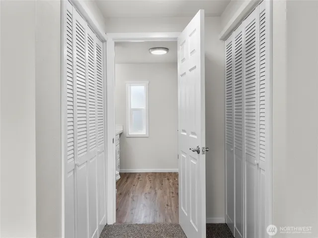 a view of a bathroom from the hallway