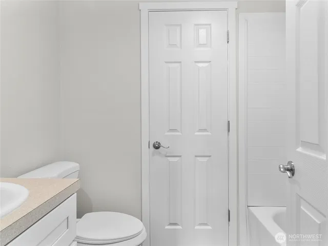 a view of a balcony with wooden floor