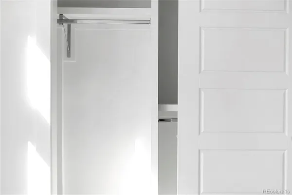 a view of a floor to ceiling window and an outdoor space