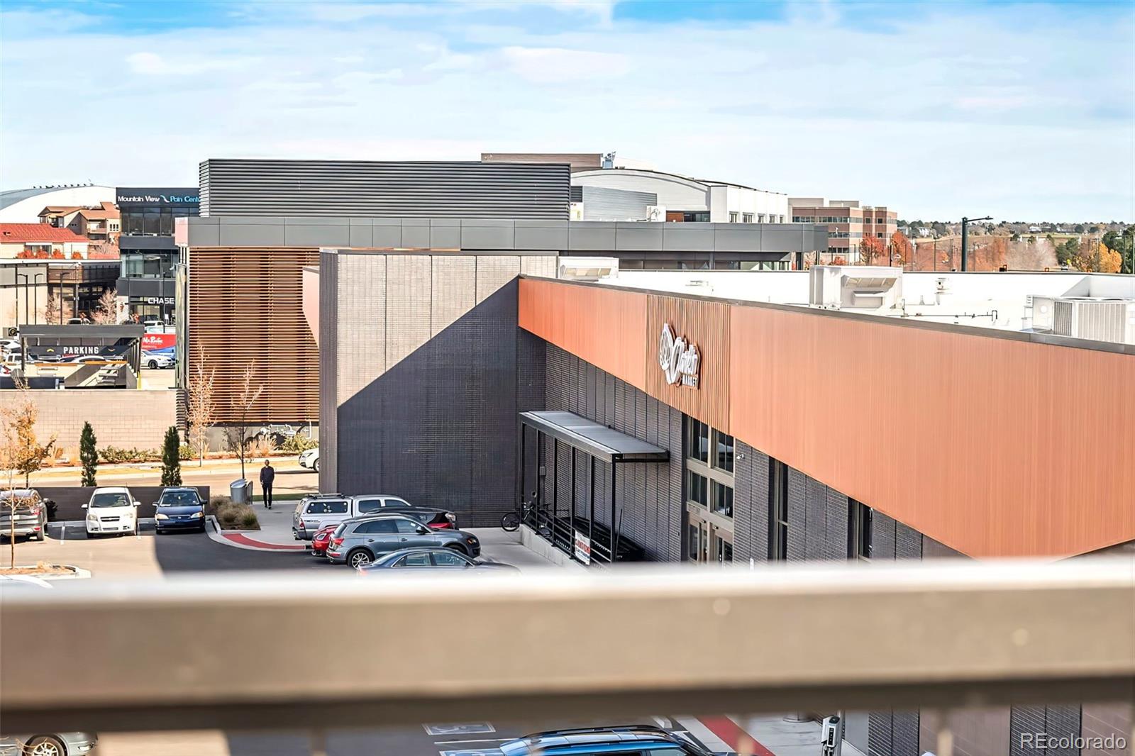 22 Oneida Court Denver, CO 80230 - Photo 20 of 44 a view of balcony with outdoor seating and city view