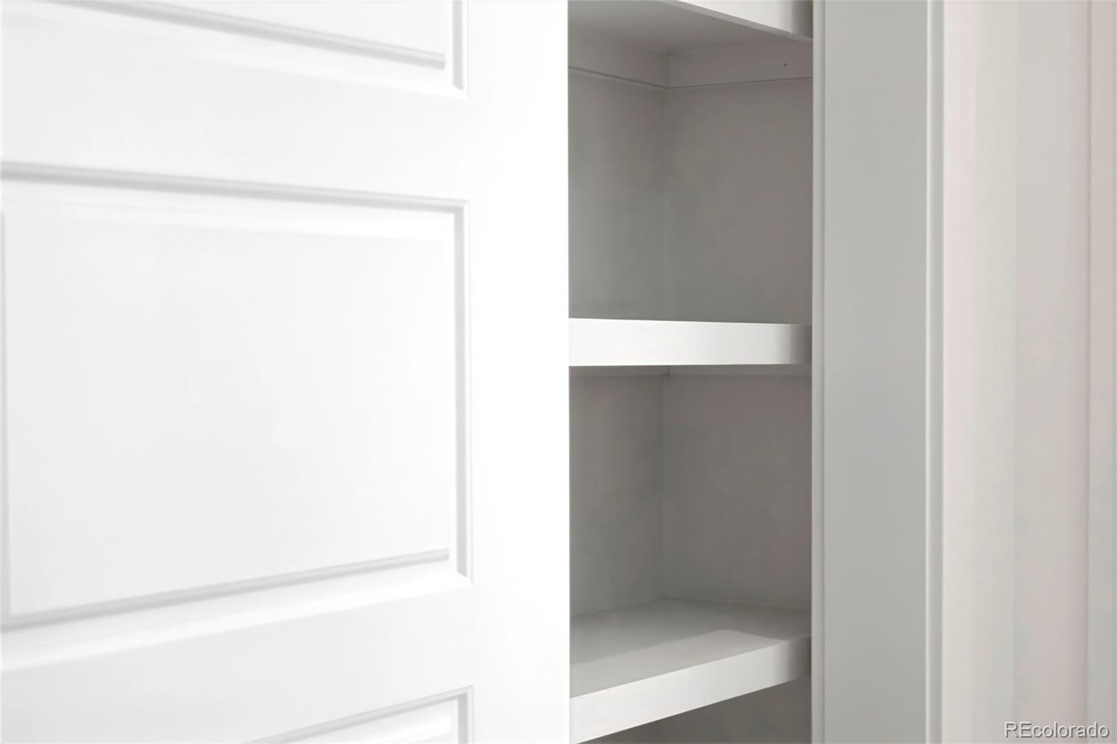 22 Oneida Court Denver, CO 80230 - Photo 9 of 44 a picture of a bathroom with a shower