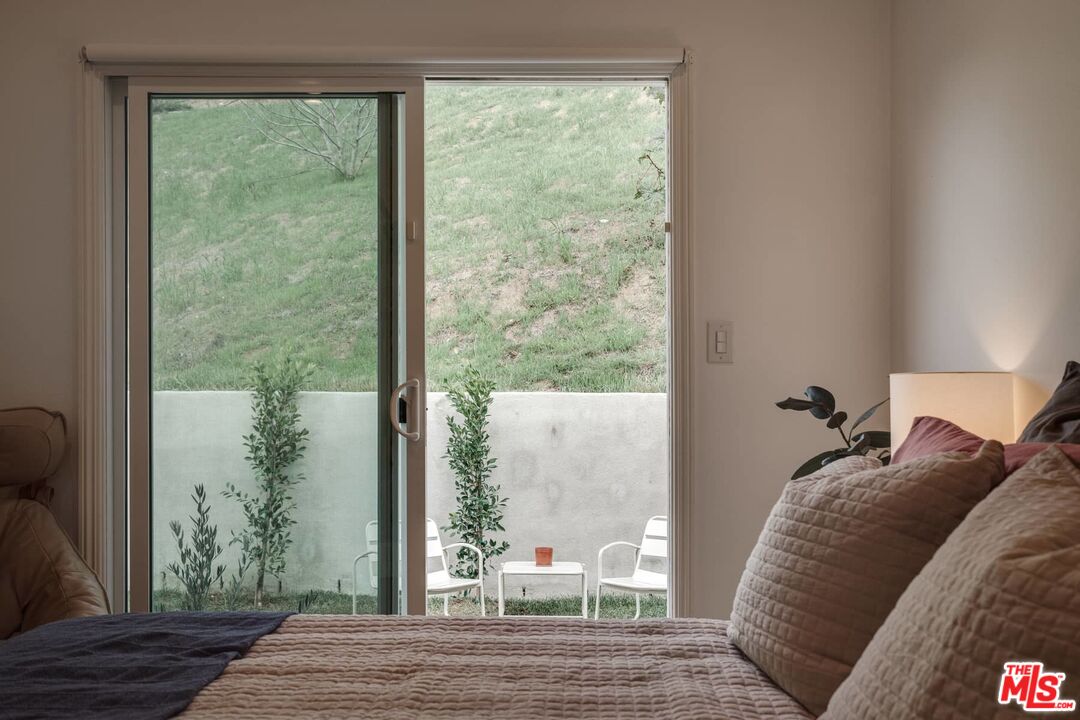 4535 Dudley Drive Los Angeles, CA 90032 - Photo 13 of 24 a living room with furniture and a window