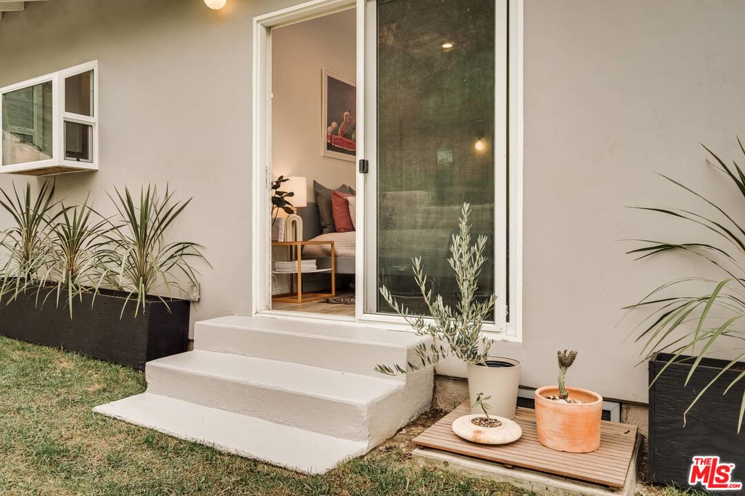 4535 Dudley Drive Los Angeles, CA 90032 - Photo 17 of 24 a living room with furniture and a potted plant