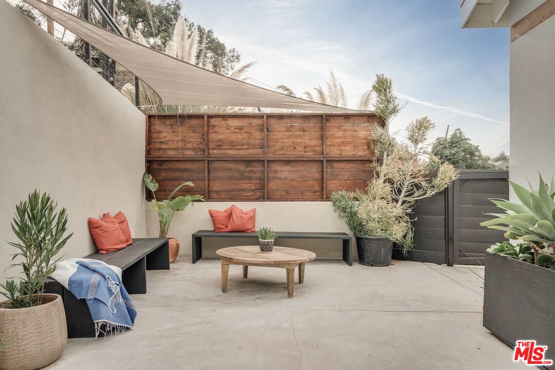 4535 Dudley Drive Los Angeles, CA 90032 - Photo 20 of 24 a backyard of a house with outdoor seating