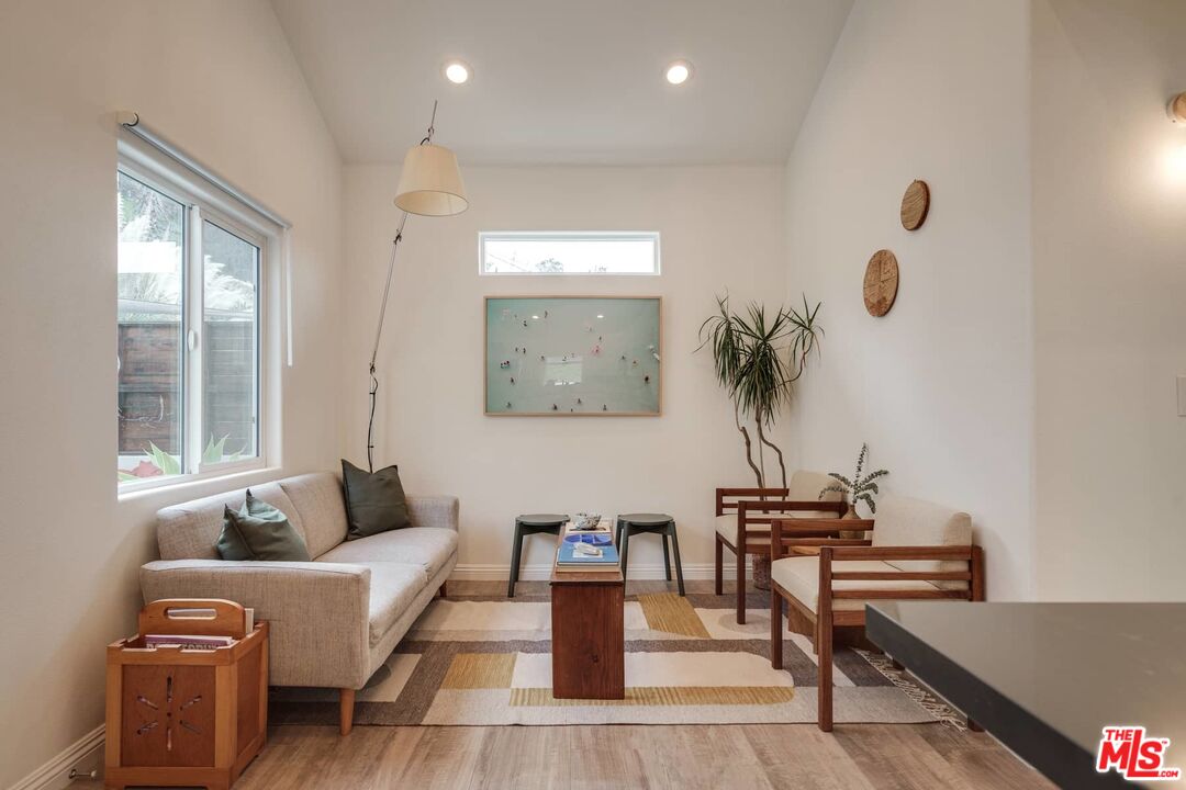 4535 Dudley Drive Los Angeles, CA 90032 - Photo 4 of 24 a living room with furniture and wooden floor