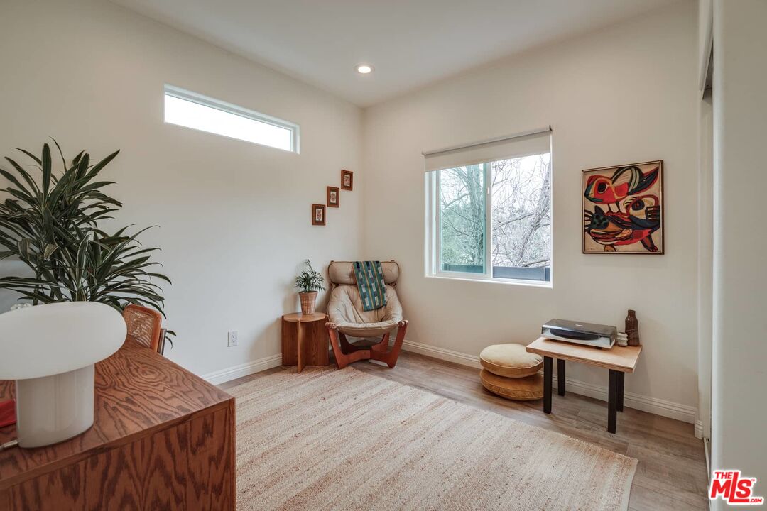 4535 Dudley Drive Los Angeles, CA 90032 - Photo 9 of 24 a living room with furniture and a potted plant