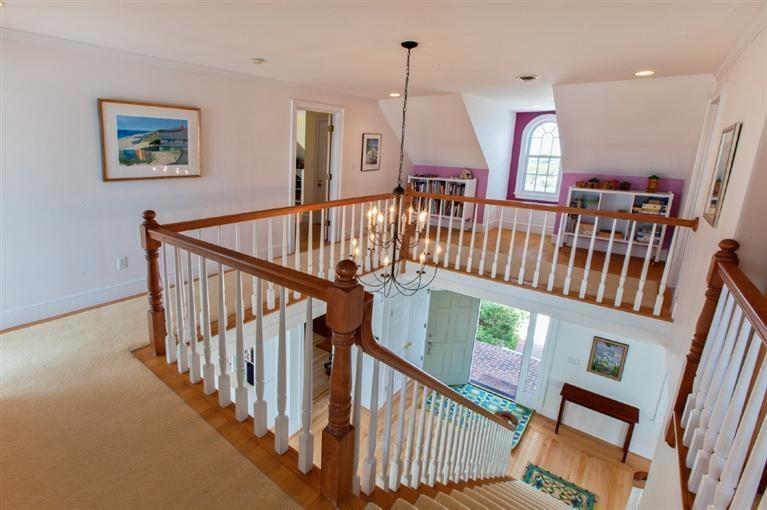 64 Corn Hill Road Truro, MA 02666 - Photo 12 of 30 a view of staircase with railing and white walls