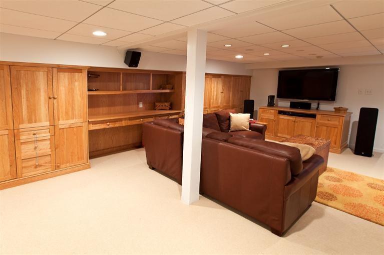 64 Corn Hill Road Truro, MA 02666 - Photo 19 of 30 a living room with furniture a flat screen tv and kitchen view