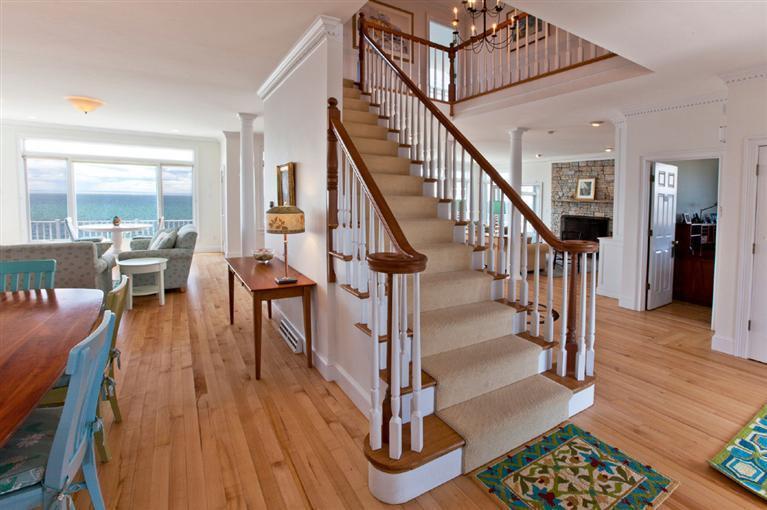 64 Corn Hill Road Truro, MA 02666 - Photo 5 of 30 a view of entryway dining room and hall with wooden floor