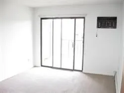 a view of a room with a window