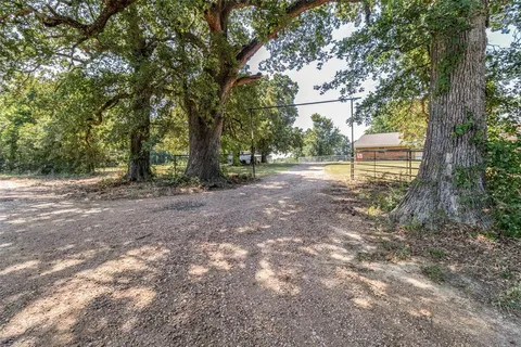 a view of backyard with green space