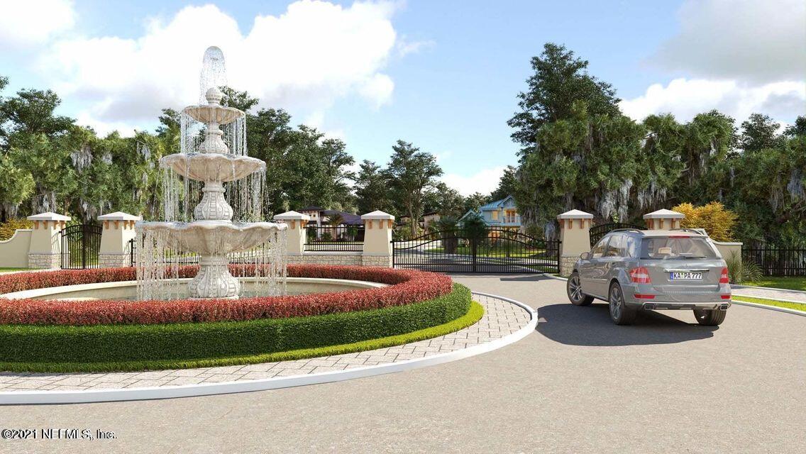 137 Canopy Hall Dr Street St. Augustine, FL 32095 - Photo 3 of 7 a front view of a house with cars parked