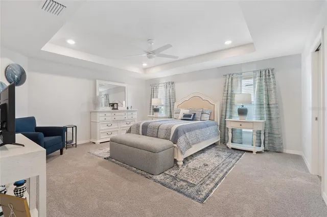 a bedroom with furniture and a window