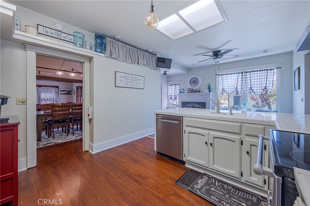 14625 Le Grand Road Le Grand, CA 95333 - Photo 30 of 60 a kitchen with stainless steel appliances granite countertop a stove and cabinets