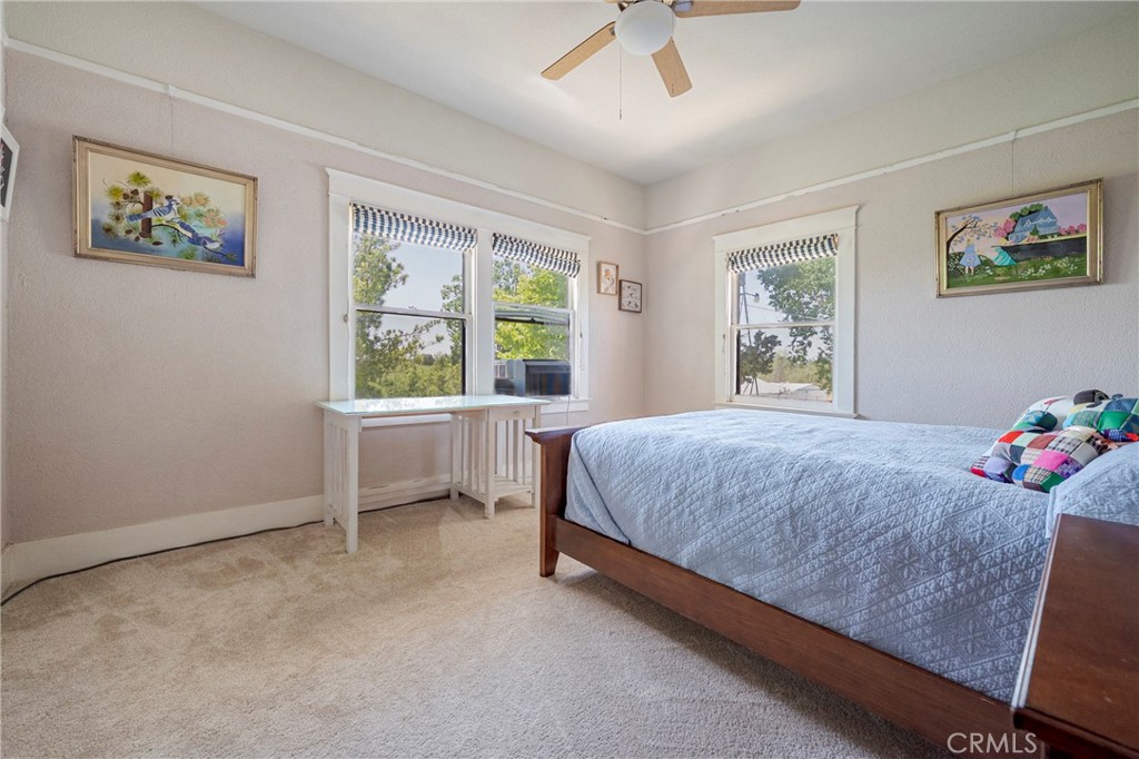 14625 Le Grand Road Le Grand, CA 95333 - Photo 46 of 60 a bedroom with a bed and a window