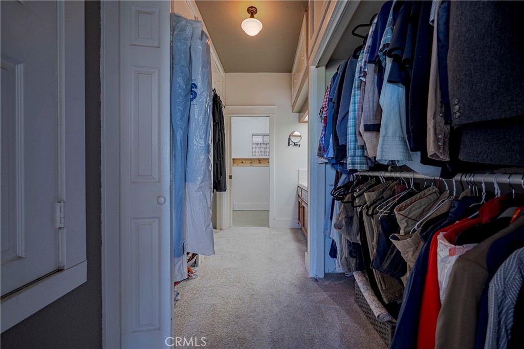14625 Le Grand Road Le Grand, CA 95333 - Photo 53 of 60 a view of walk in closet with clothes