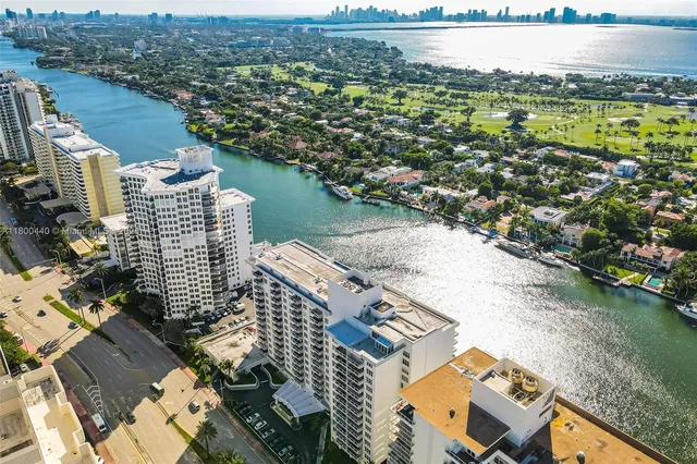 an aerial view of city and lake