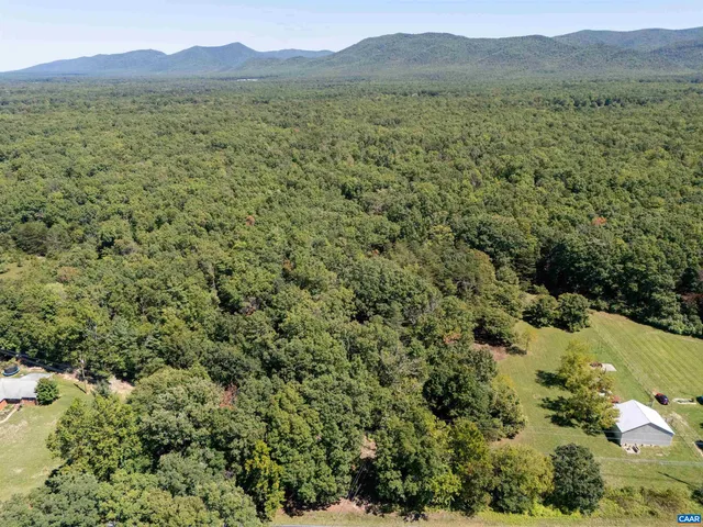 a view of an outdoor space and a lake view