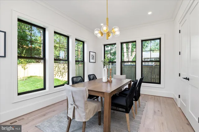 a bedroom with a large bed and a balcony view
