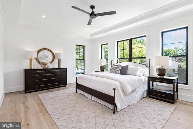a living room with furniture a window and a fireplace