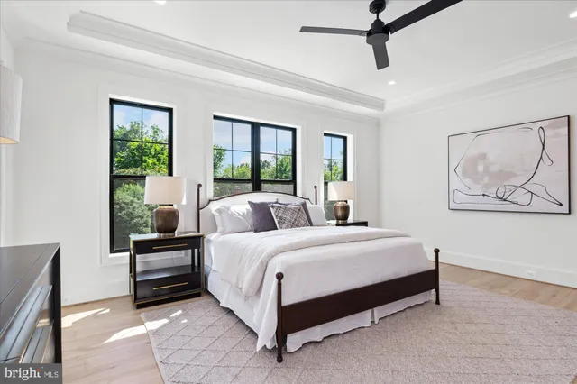 a bed room with a bed and a television