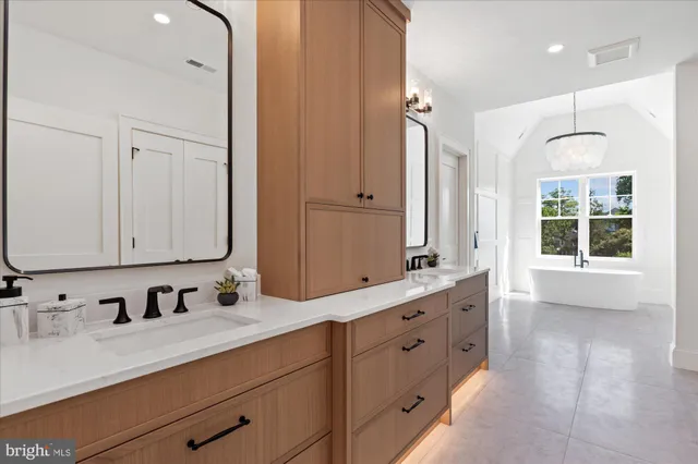 a view of a livingroom with wooden floor and a fireplace