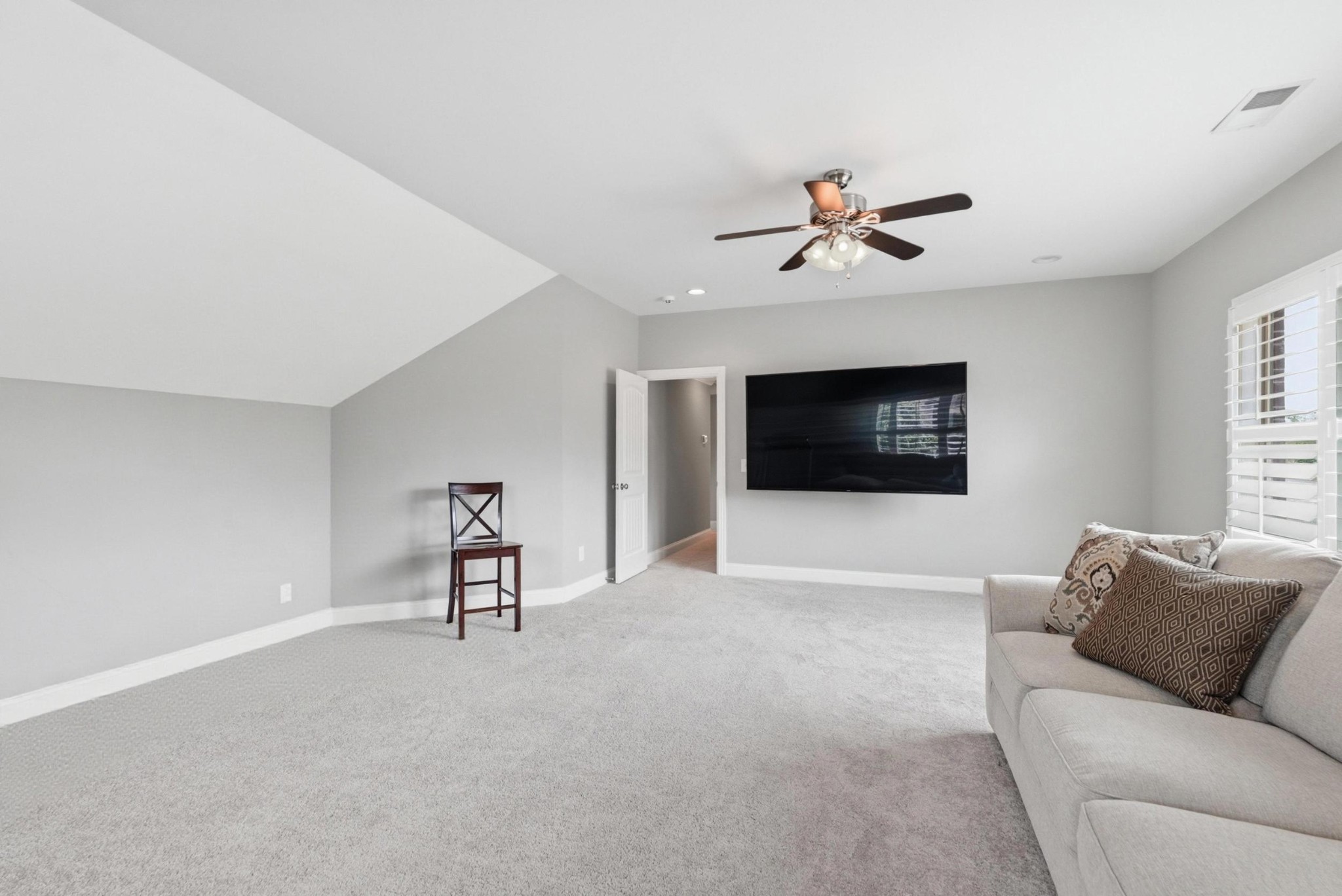 6000 Wallaby Court Spring Hill, TN 37174 - Photo 42 of 57 a living room with furniture and a flat screen tv