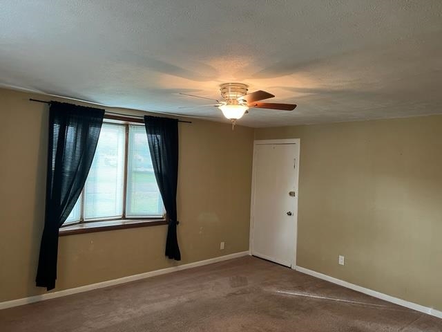 2122 Rivington Road Loves Park, IL 61111 - Photo 8 of 15 an empty room with windows and entrance